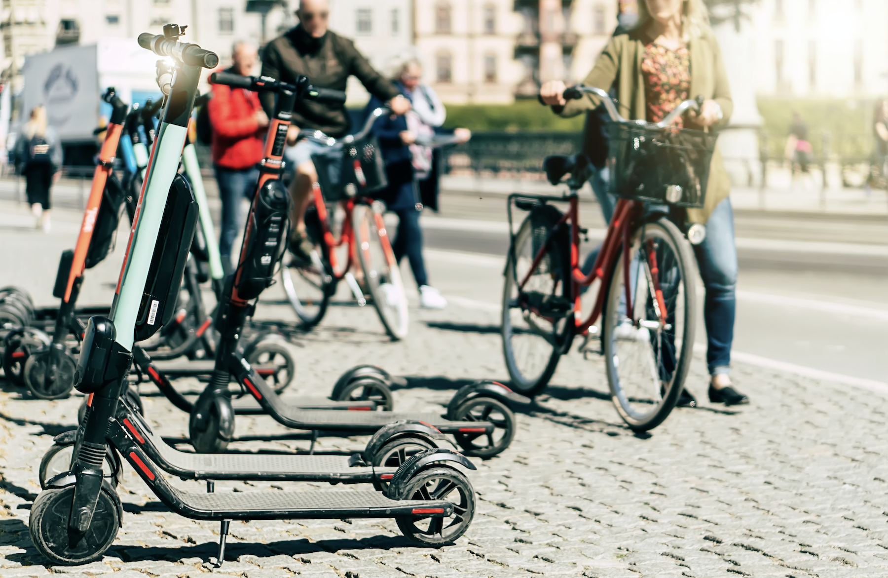 The future of micromobility, shared e-scooters and people with bicycles
